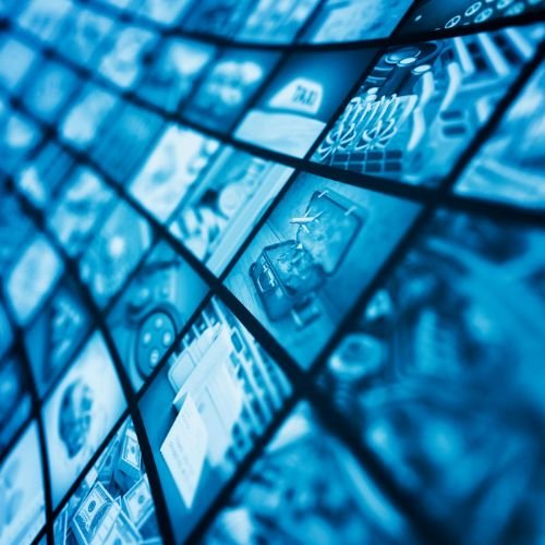 Blue digital screen grid with upward perspective showing technology and data connectivity